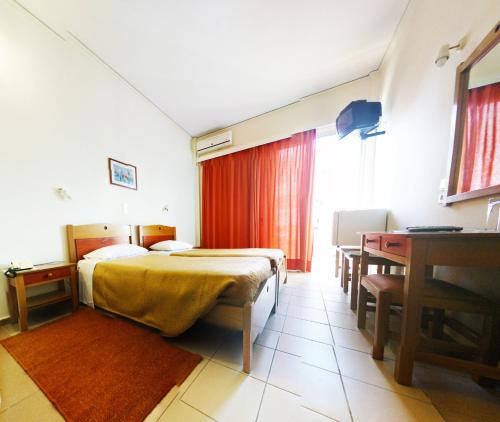 Imagen de la habitación del Hotel Delfini, Patras. Foto 5