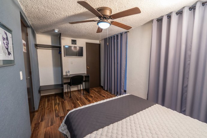 Imagen de la habitación del Hotel Delf-inn. Foto 9