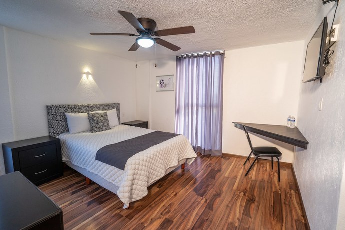 Imagen de la habitación del Hotel Delf-inn. Foto 11