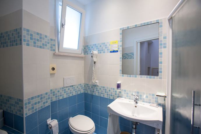 Imagen de la habitación del Hotel Delfino, Senigallia. Foto 13