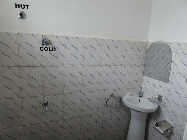 Imagen de la habitación del Hotel Delhi Gardens. Foto 11
