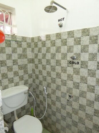 Imagen de la habitación del Hotel Delhi Gardens. Foto 13