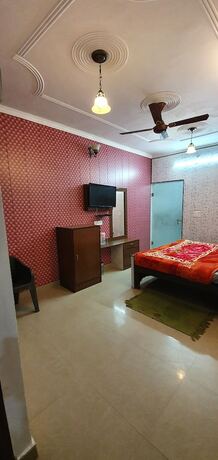 Imagen de la habitación del Hotel Delhi Homes By Lujos. Foto 17