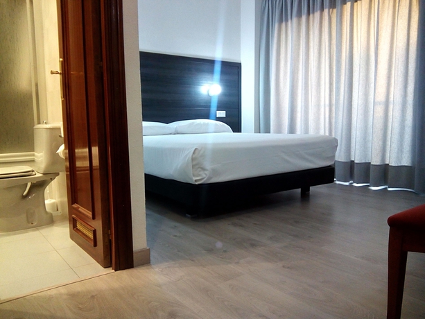 Imagen de la habitación del Hotel Delicias. Foto 13