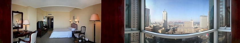 Imagen de la habitación del Hotel Delight, DALIAN. Foto 3