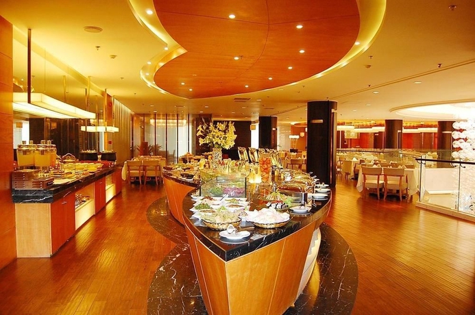 Imagen del bar/restaurante del Hotel Delight, DALIAN. Foto 2