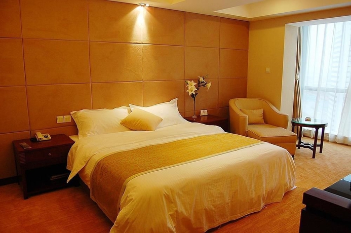 Imagen de la habitación del Hotel Delight, DALIAN. Foto 7