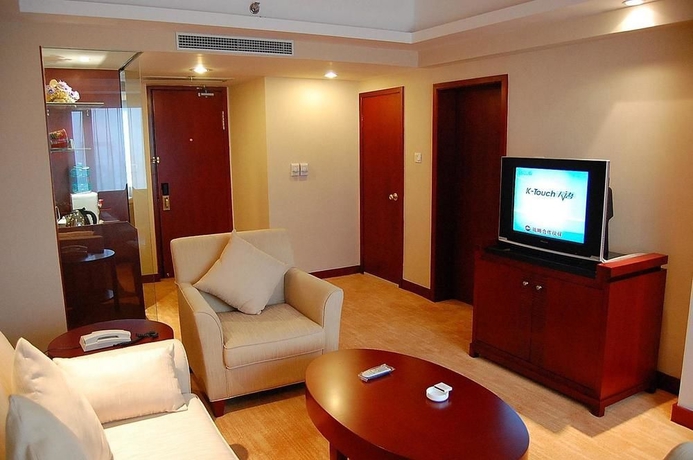 Imagen de la habitación del Hotel Delight, DALIAN. Foto 9