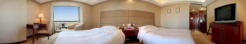 Imagen de la habitación del Hotel Delight, DALIAN. Foto 10