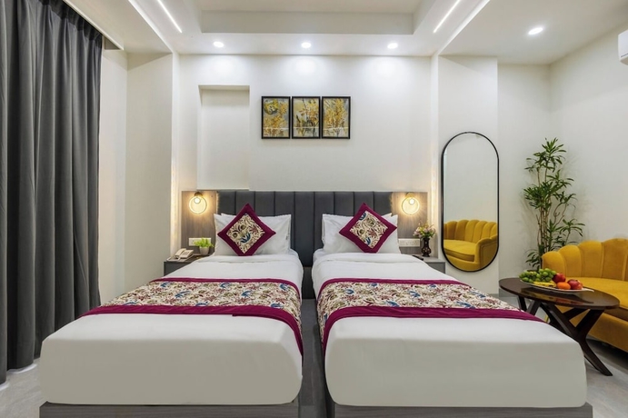Imagen de la habitación del Hotel Delight Gurugram. Foto 6