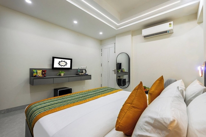 Imagen de la habitación del Hotel Delight Gurugram. Foto 7