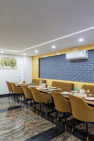 Imagen del bar/restaurante del Hotel Delight Gurugram. Foto 1
