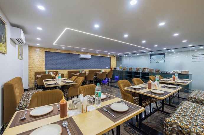 Imagen del bar/restaurante del Hotel Delight Gurugram. Foto 2