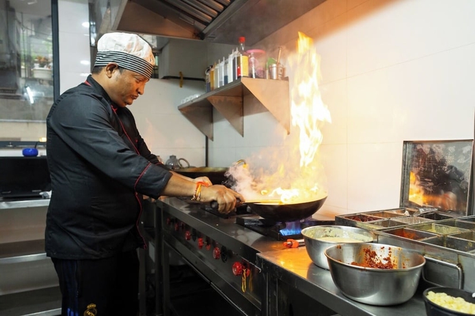 Imagen del bar/restaurante del Hotel Delight Gurugram. Foto 3