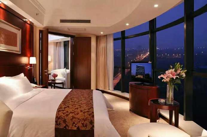 Imagen de la habitación del Hotel Delightel Hotel West Shanghai. Foto 7