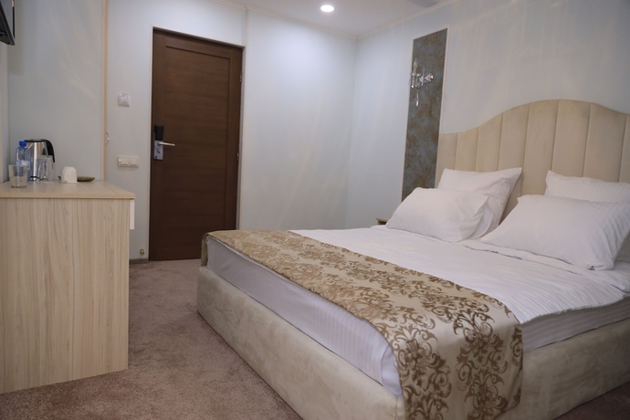 Imagen de la habitación del Hotel Delin. Foto 12