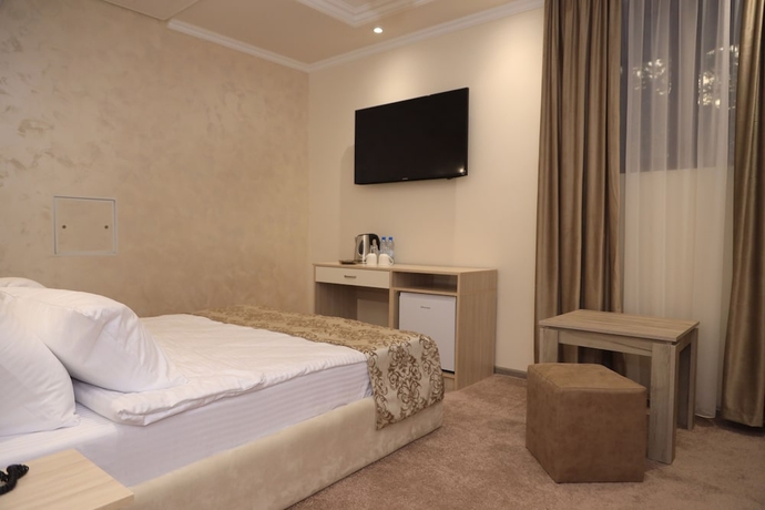 Imagen de la habitación del Hotel Delin. Foto 15
