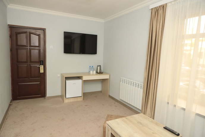 Imagen de la habitación del Hotel Delin. Foto 16
