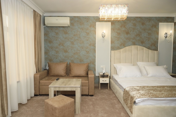 Imagen de la habitación del Hotel Delin. Foto 18