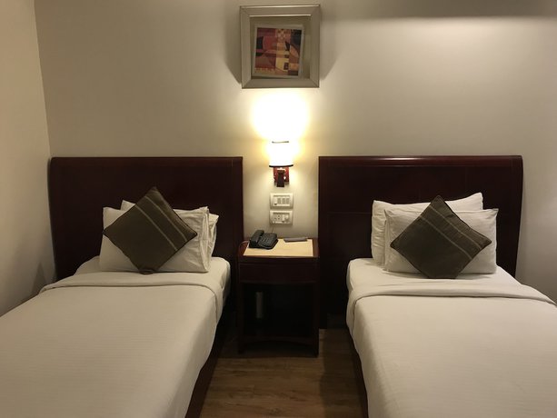 Imagen de la habitación del Hotel Delite - Faridabad. Foto 9