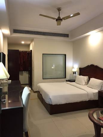 Imagen de la habitación del Hotel Delite - Faridabad. Foto 14