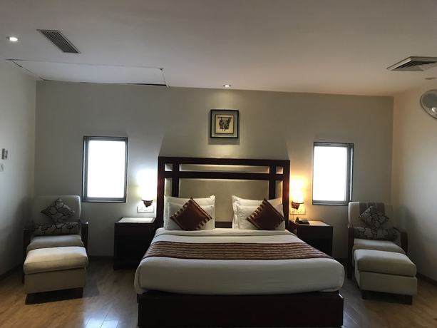 Imagen de la habitación del Hotel Delite - Faridabad. Foto 15