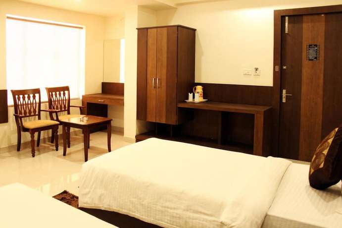 Imagen de la habitación del Hotel Delite Grand, Jabalpur. Foto 8