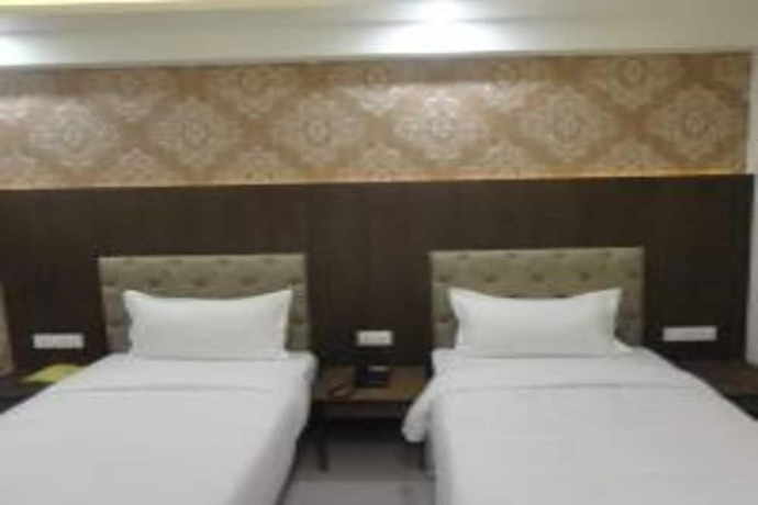 Imagen de la habitación del Hotel Delite Grand, Jabalpur. Foto 9
