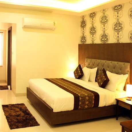 Imagen de la habitación del Hotel Delite Grand, Jabalpur. Foto 13