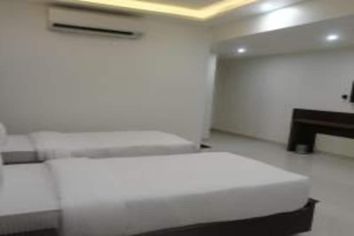 Imagen de la habitación del Hotel Delite Grand, Jabalpur. Foto 15