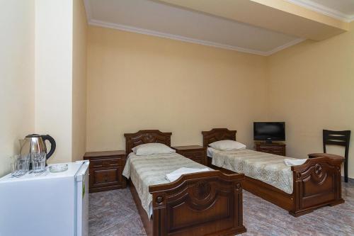 Imagen de la habitación del Hotel Delkon. Foto 8