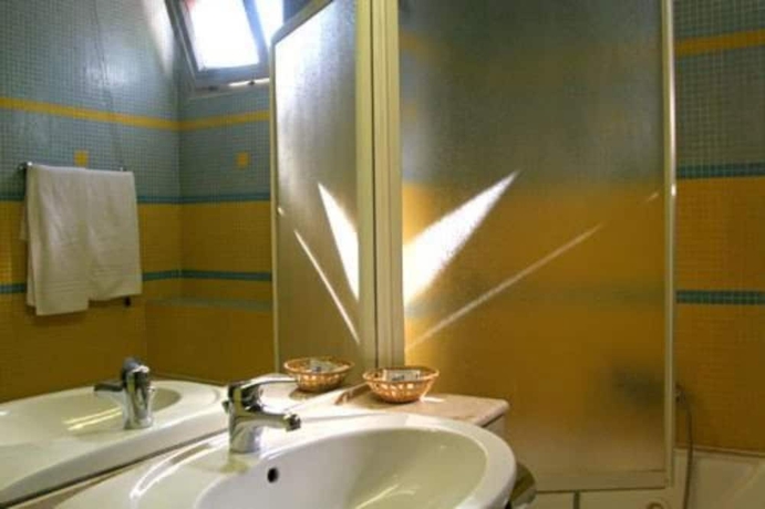 Imagen de la habitación del Hotel Della Baia. Foto 15