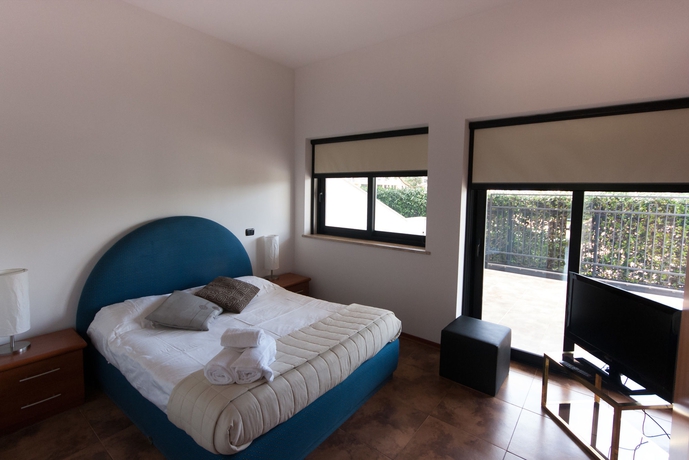 Imagen de la habitación del Hotel Della Piana Residence. Foto 3