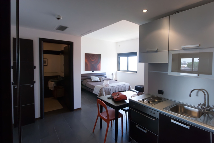 Imagen de la habitación del Hotel Della Piana Residence. Foto 11