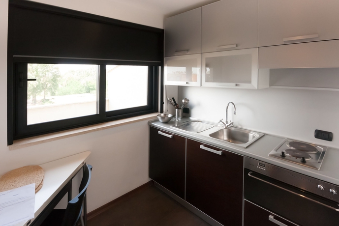 Imagen de la habitación del Hotel Della Piana Residence. Foto 12