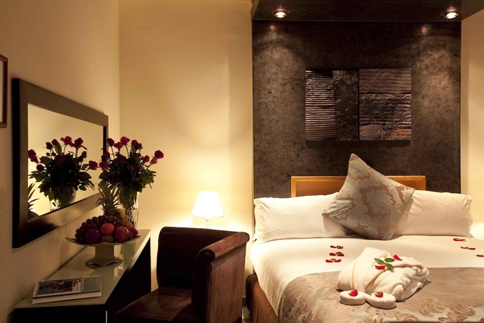 Imagen de la habitación del Hotel Dellarosa Boutique and Spa. Foto 4