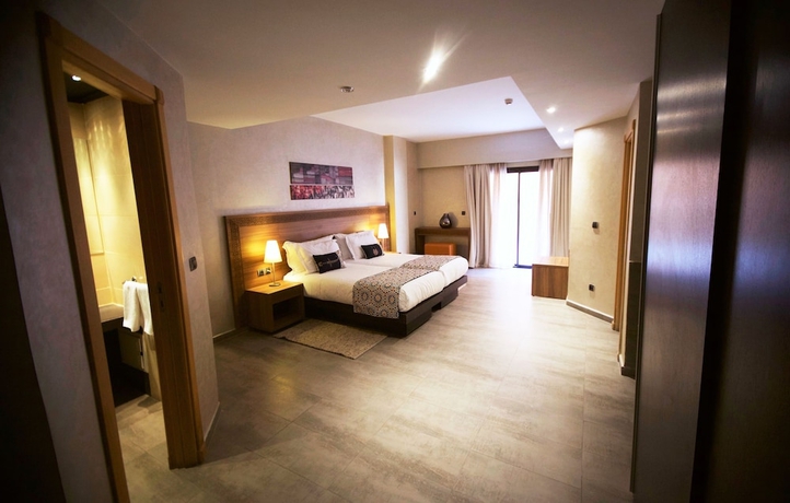 Imagen de la habitación del Hotel Dellarosa Boutique and Spa. Foto 6