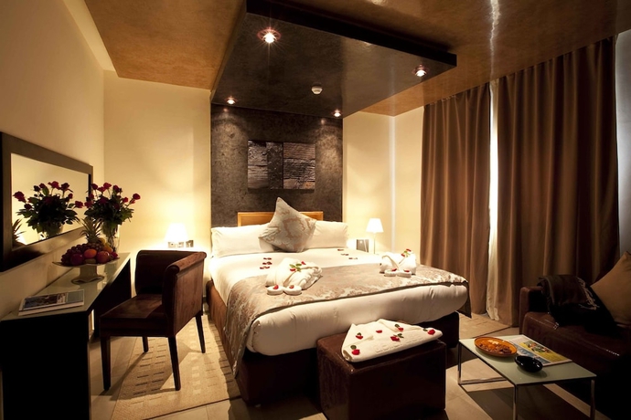 Imagen de la habitación del Hotel Dellarosa Boutique and Spa. Foto 9