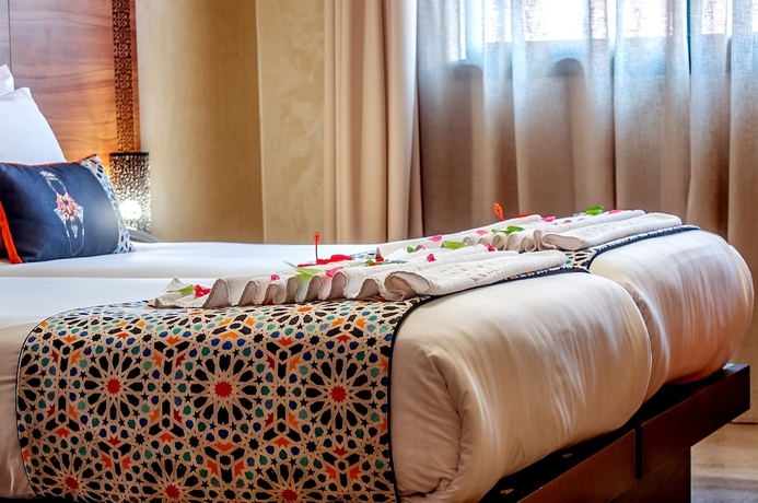 Imagen de la habitación del Hotel Dellarosa Boutique and Spa. Foto 13