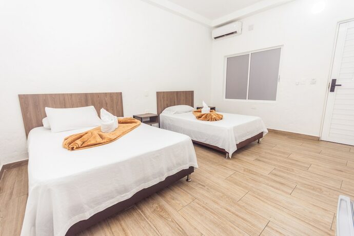 Imagen de la habitación del Hotel Dellhar Americano By Del Toro. Foto 11