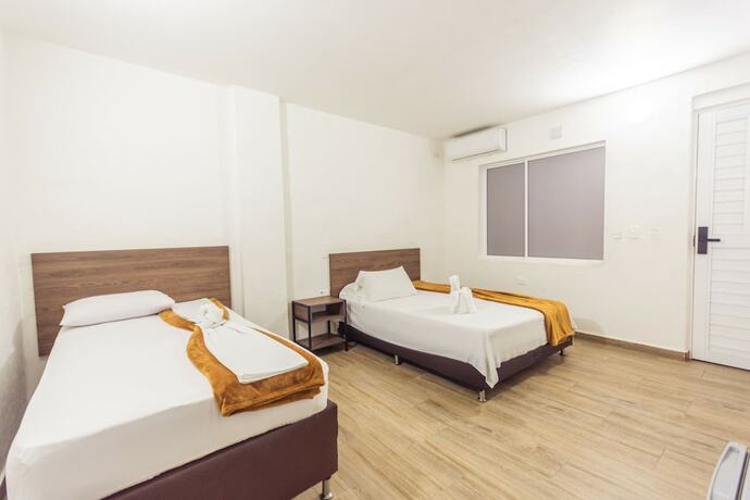 Imagen de la habitación del Hotel Dellhar Americano By Del Toro. Foto 15