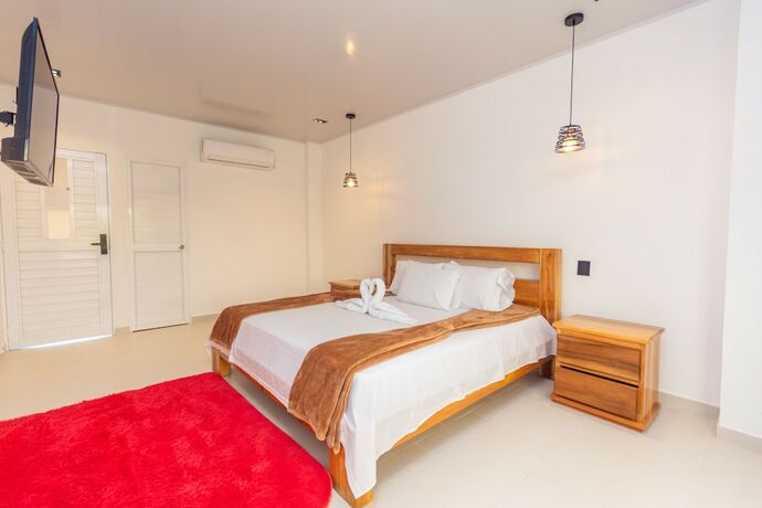 Imagen de la habitación del Hotel Dellhar Americano By Del Toro. Foto 16