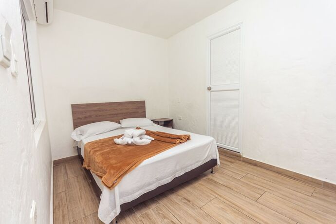 Imagen de la habitación del Hotel Dellhar Americano By Del Toro. Foto 17