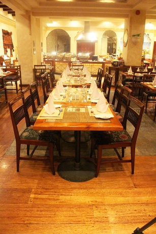 Imagen del bar/restaurante del Hotel Delmon International. Foto 5