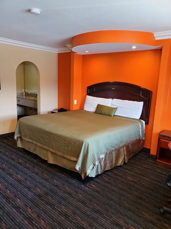 Imagen de la habitación del Hotel Delmonico Inn and Suites. Foto 10