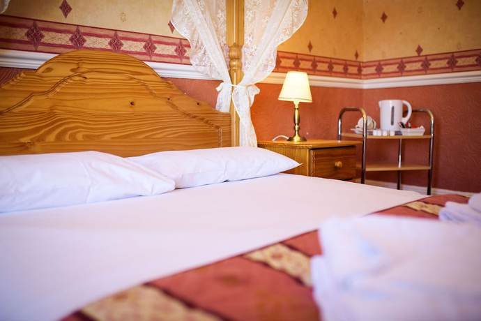 Imagen de la habitación del Hotel Delmont. Foto 2