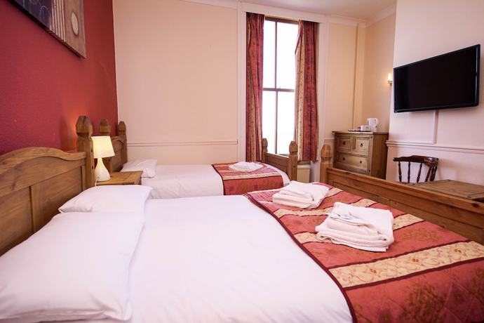 Imagen de la habitación del Hotel Delmont. Foto 4