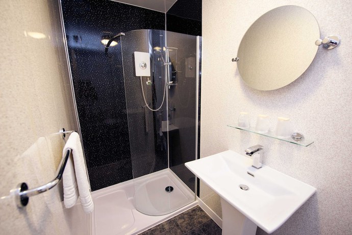 Imagen de la habitación del Hotel Delmont. Foto 6