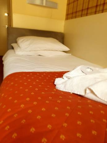 Imagen de la habitación del Hotel Delmont. Foto 8