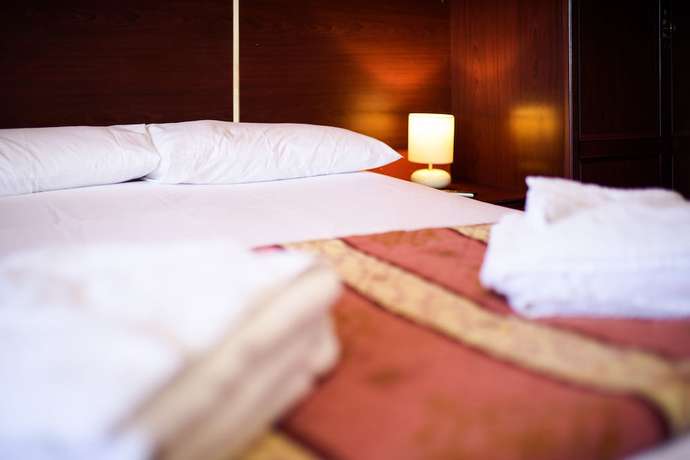 Imagen de la habitación del Hotel Delmont. Foto 15
